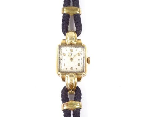 ROLEX - a lady's 18ct gold Precision mechanical wristwatch, champagne dial with gilt Arabic and dot hour markers and bevelled