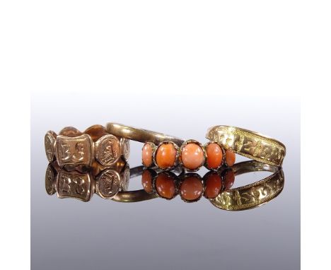 4 various rings, including 14ct circular panel band ring, unmarked coral ring, etc., 7.3g total, (4)Lot sold as seen unless s