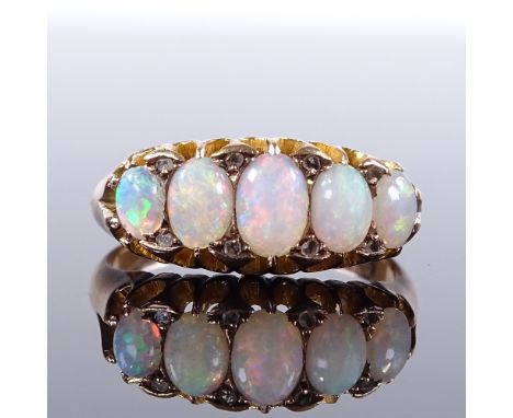 An Edwardian 9ct gold graduated cabochon opal rose-cut diamond half-hoop ring, maker's marks D and P, hallmarks Chester 1905,