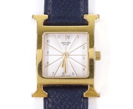 HERMES - a lady's gold plated stainless steel Heure H quartz wristwatch, ref. HH1.201, silvered radiant engine turned dial wi