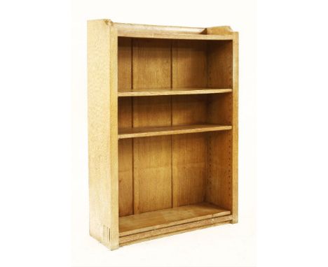 A Robert 'Mouseman' Thompson oak open bookcase,with three adjustable shelves, with a mouse signature,83cm wide26cm deep122cm 