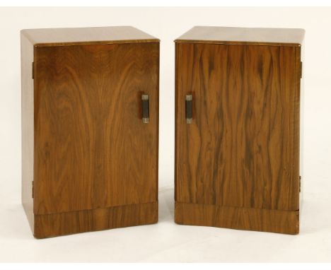 A pair of walnut bedside cabinets,each with an internal drawer and shelf, labelled a 'SUPERSUITE PRODUCTION', with octagonal 