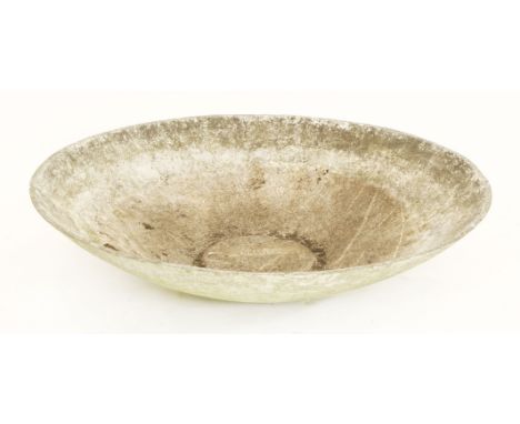 A contemporary garden planter of dish-shaped form, impressed 'Urastone'106cm diameter 