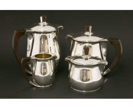 A French silver four-piece tea and coffee set, Gustave Keller, Paris, c.1930,comprising: coffee pot, teapot, sugar bowl and m