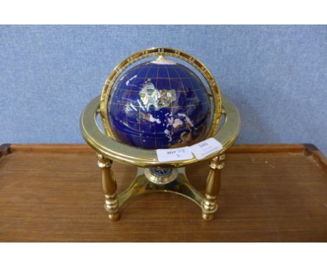 A small brass and gem set terrestrial globe 