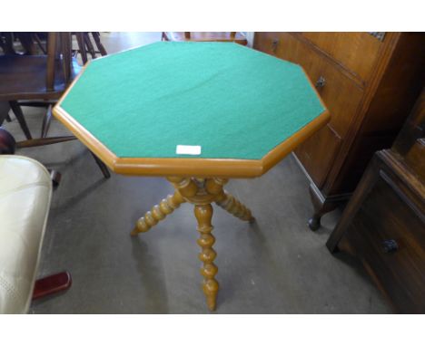 A walnut bobbin turned octagonal gypsy's table 