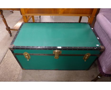 A green steamer trunk 