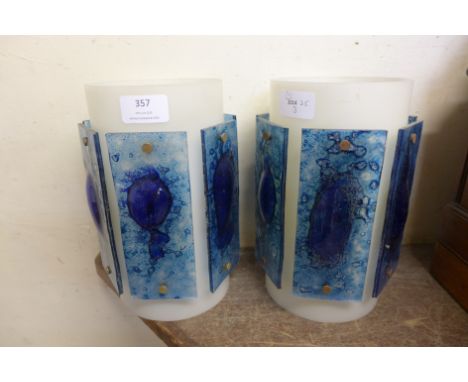 A pair of late 60's/early 70's acrylic studio glass light shades, 23cm h 