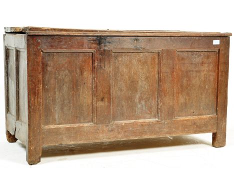A 17th century&nbsp; oak chest / coffer. The coffer having a hinged lid opening to reveal a spacious interior, recessed field
