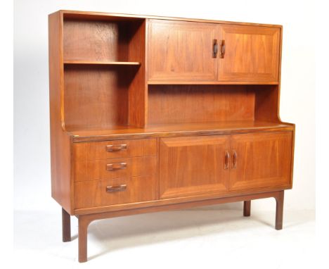 A retro vintage mid 20th century G Plan teak&nbsp;highboard sideboard credenza, being raised on tapering supports. The G Plan