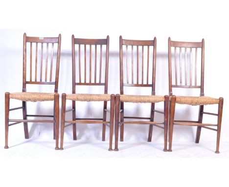 A set of four vintage mid 20th century country / farmhouse dining chairs having a slatted back rest with envelope rush seats 