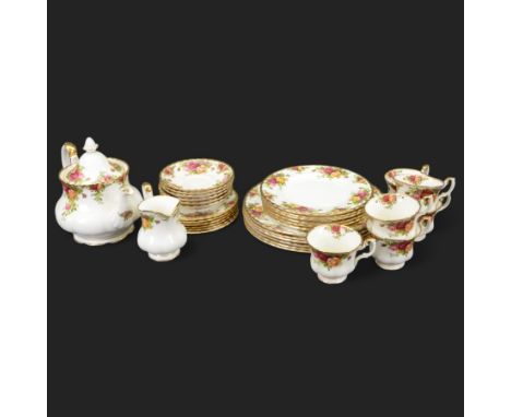 Royal Albert Country Roses tea and dinner service for six place settings, comprising teapot, milk jug, cups and saucers, dess