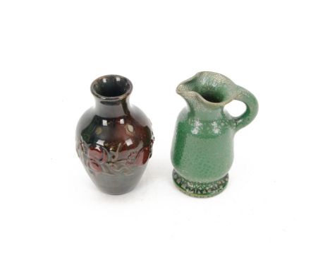 Elton ware slipware pottery vase with floral relief decoration, together with green and silver glaze jug