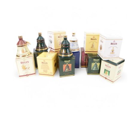 Twelve Bells Old Scotch Whisky commemorative decanters, including Royal and Christmas examples, all in presentation boxes