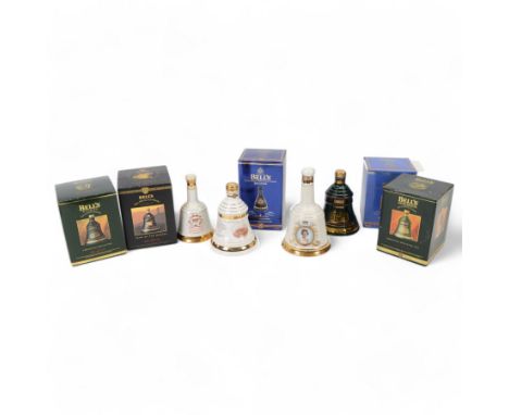 Nine Bells Old Scotch Whisky commemorative decanters, including Royal and Christmas examples, eight in presentation boxes
