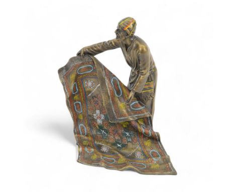 After Franz Bergmann bronzed sculpture of a carpet seller, with colourful painted highlights throughout, H19cm