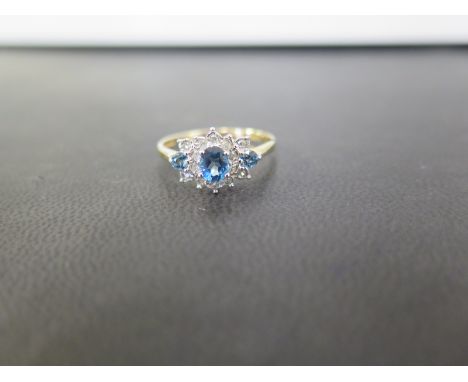 A 9ct gold topaz and diamond cluster ring - Hallmarked Birmingham - Ring size R - Weight approx 2.1gms
Condition Report: Good