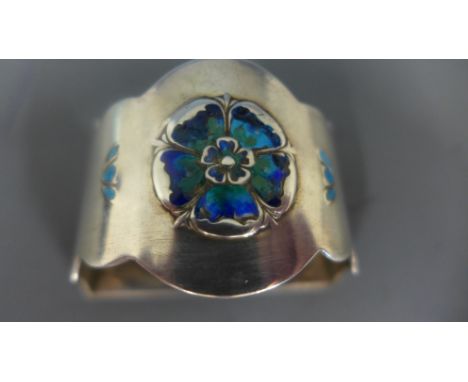 A silver enamel napkin ring Birmingham 1911 for Liberty approx weight 1.2 troy oz - some minor wear but retouching to enamel