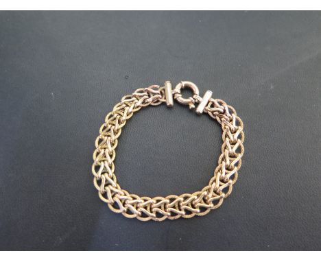 A 9ct gold fancy-link bracelet - Hallmarked Sheffield - Length 20.5cms - Weight approx 12.6gms
Condition Report: Good - With 