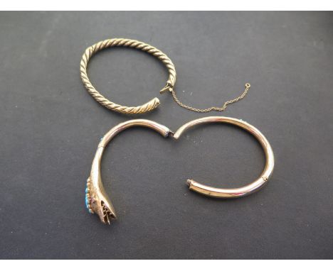 A twist hinged bangle - Stamped 18 - Weight approx 15.1gms - Together with a broken turquoise and gem-set snake bangle - Test