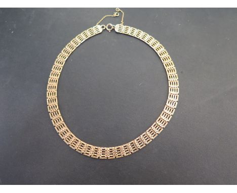 A 9ct gold gate-style collar - Hallmarked Sheffield - Length approx 40cms - Weight approx 28.7gms
Condition Report: Good - Wi