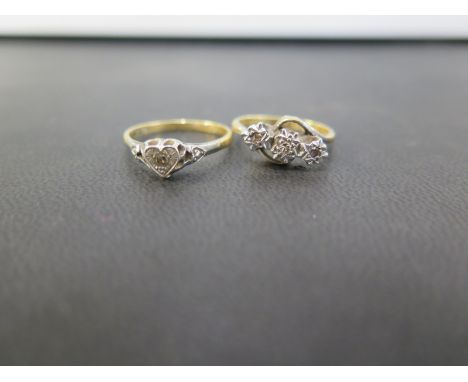 Two diamond rings - To include a three-stone crossover, ring size K 1/2 - Together with a single-stone within a heart-shape s