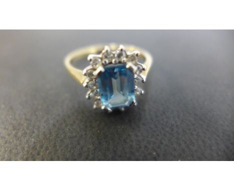 A 9ct gold diamond cluster ring size R approx 3 grams - some usage marks