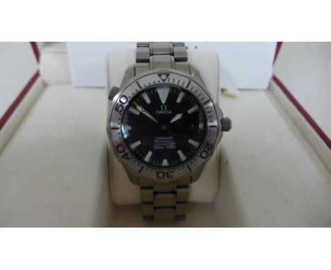 An Omega Seamaster manual wind wrist watch with black face and date aperture on Omega steel bracelet with spare links in orig