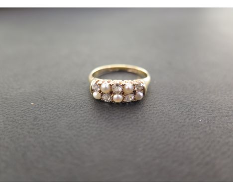 An early 20th century 18ct gold seed pearl and old-cut diamond two-row ring - Size K 1/2 - Weight approx 2.9gms
Condition Rep