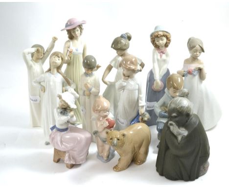 Three Lladro figures (two boxes) together with ten Nao figures 