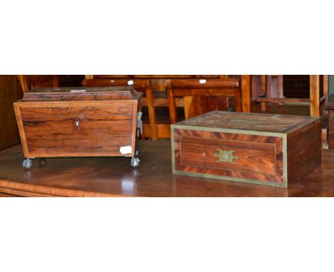 A 19th century cross banded rosewood travelling box and a 19th century rosewood tea caddy 