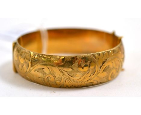 A 9ct gold bangle 24.73g gross.