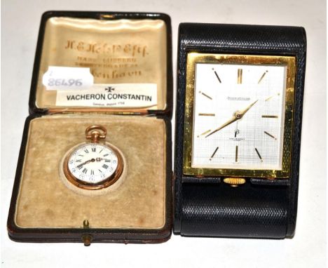 A small Continental yellow metal fob watch, circa 1900, bears marks, in fitted case together with a Jaeger LeCoultre travelli