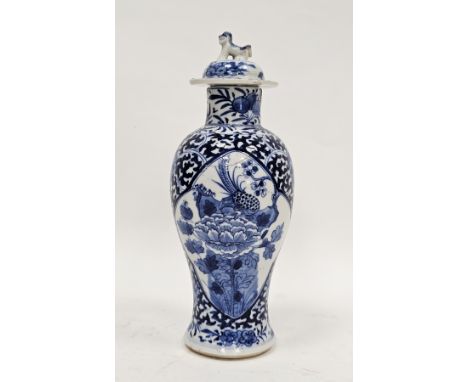 Chinese porcelain blue and white baluster vase and a matched cover, four character Kangxi mark, Qing Dynasty, painted with a 