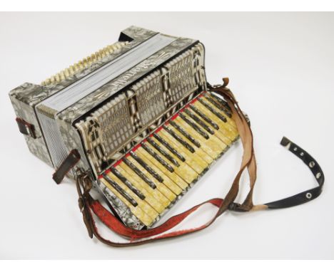 Cased Stanelli piano accordion by Meinel and Herold, having &nbsp;a grey pearlescent finish, 45cm wide&nbsp;