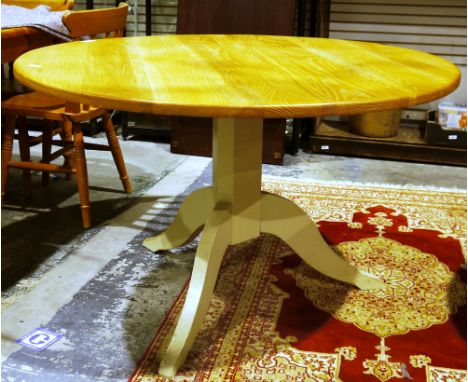 Neptune contemporary Chichester dining table with circular oak plank top on a grey painted pedestal base with three splayed l