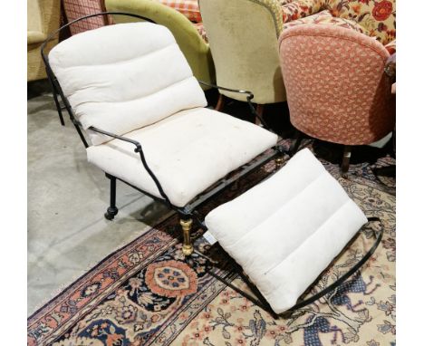 19th century brass and iron metamorphic campaign chair/bed, having an arched back, rectangular arms and trellis frame, with f