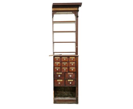 Victorian mahogany shop apothecary end cabinet, the moulded cornice (cut to one side) over an upper section comprising four o