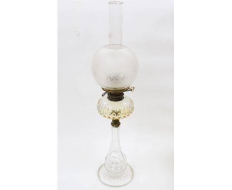 Late 19th/early 20th century oil lamp&nbsp;having globular opaque etched glass shade, cut glass clear well, brass fittings an