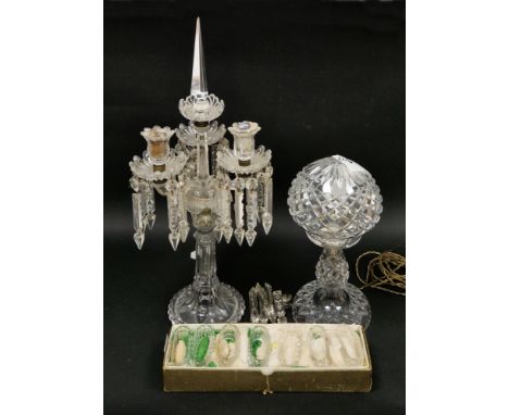 Early 20th century Baccarat crystal three-branch candelabrum, surmounted with a pyramid above a central foliate drip pan and 