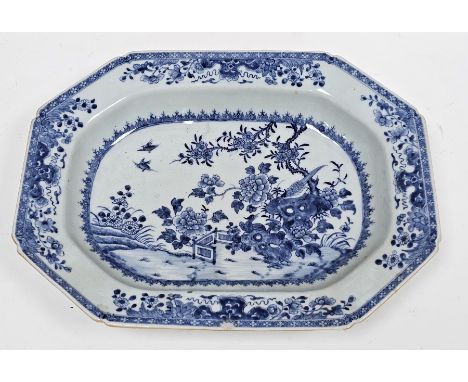 Late 18th century Chinese Export porcelain blue and white shaped rectangular dish, painted with a bird perched on rockwork am