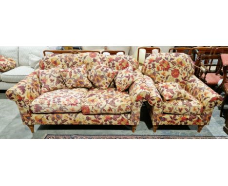 Wesley Barrell modern two-seater sofa and matching armchair&nbsp;upholstered in a floral fabric on cream ground, sofa 93cm hi