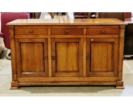 Contemporary MultiYork cherrywood sideboard&nbsp;comprising three frieze drawers with metal knob handles, over three panelled