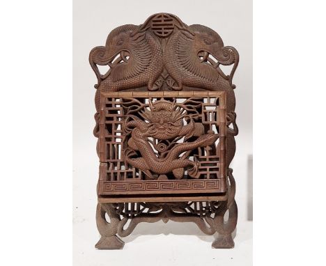 Chinese hardwood folding folio stand&nbsp;with easel back, carved throughout with stylised dragons and Chinese symbols, 61cm 