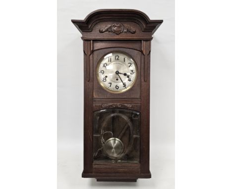 French wall clock, the brush steel dial inscribed for Opsomer Paris in carved mahogany case 