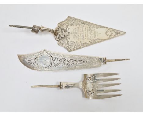 Three Victorian silver items (lacking handles), including a pierced and foliate engraved fish serving knife blade and fork an