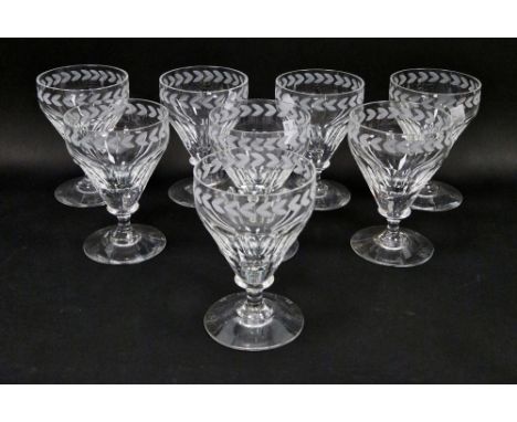 Eight cut and engraved Mappin &amp; Webb rummers, in the Regency style, engraved with a band of laurel above panel cutting on