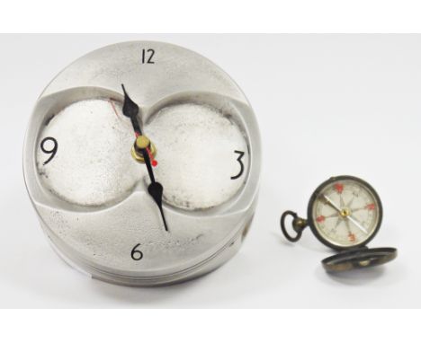 Aerotiques metal clock&nbsp;of circular form,&nbsp;formed from a piston of an aeroplane, battery operated, the dial with arab