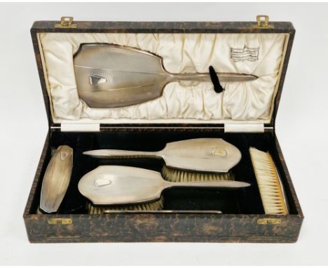 Art Deco silver-backed dressing table set, Birmingham 1935, William Neal Limited, comprising six pieces including hand-held m