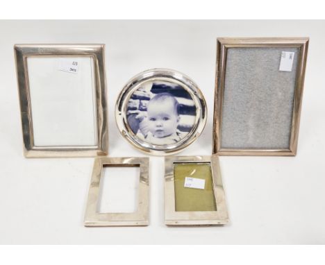 Collection of four silver-framed easel back photograph frames&nbsp;including a plain rectangular frame with oak back, Birming